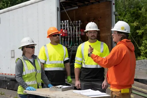 Drilling assistants having a meeting with a superior